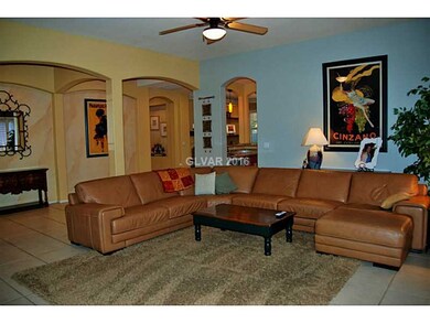 Living Room. View towards wet bar and family room.