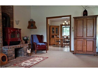 Great Room. Great Room into Kitchen Nook. Brick chimney chase for Wood Stove.