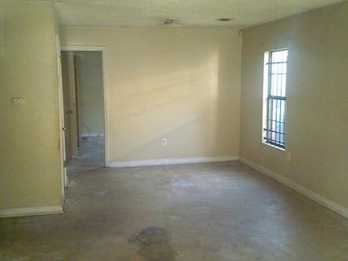 Empty room with baseboards