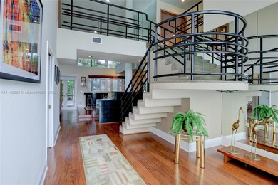 Foyer Entrance w/ Modern Stairs