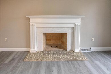 Wood-burning fireplace in living room