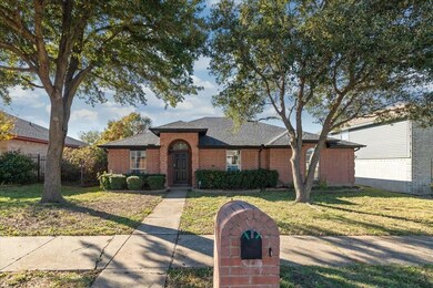 Single story home featuring a front yard
