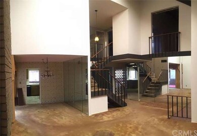 Vaulted ceilings and skylight in formal living roo