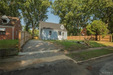 View of front of property with a front lawn