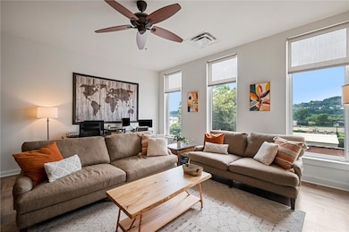 This sun-filled living space features an open layo