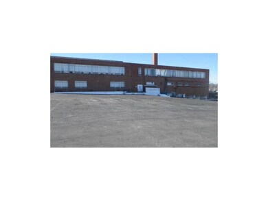 Back of building showing parking area