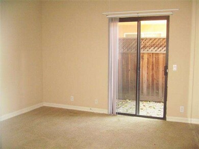 Master bedroom opens to an enclosed patio.