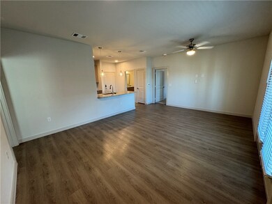 PHOTOS show the floor plan but may not be the exact unit.