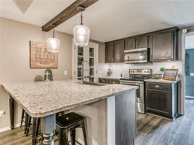 kitchen with breakfast bar & walk in pantry