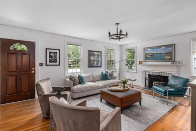 Living room with wood burning fireplace