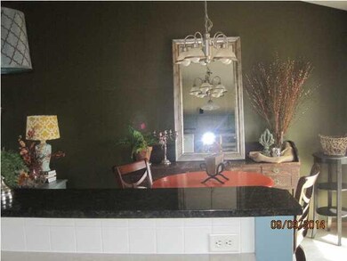 VIEW FROM KITCHEN TO EATING AREA