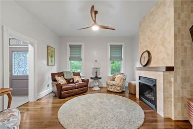 Beautiful gleaming hardwood floors and high ceilin