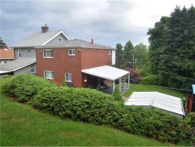 Exterior Back. Taken from the back yard. Nice alum