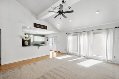 Large windows allow tons of natural light to fill