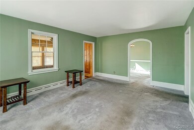 Love that Archway and heavy Baseboard molding.  This is entering the front door with rec room on left, dining room straight ahead and hall to the right.