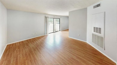 Unfurnished room featuring light wood-style floori