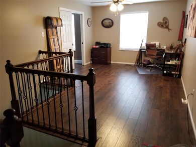 New laminate flooring in loft area and master bedr