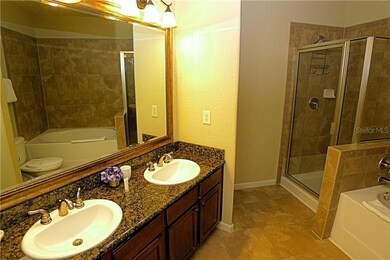 Master Bathroom with dual sinks, garden tub and shower stall
