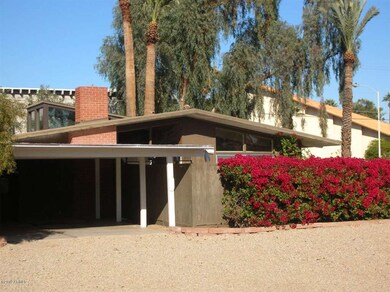 FRONT OF HOUSE & CARPORT