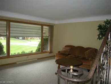 Spacious living room with large picture window.