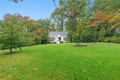 Charming home nestled on a peaceful half acre lot.