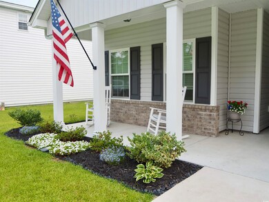 Entrance to property featuring a porch