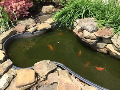 Lovely koi pond... just waiting for your personal 