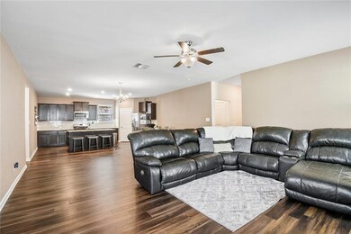 View of Living Room, Dining Area and Kitchen.