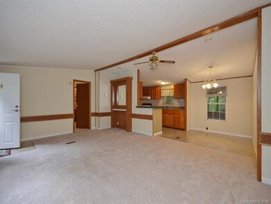 New carpet in LR which opens to kitchen and eat-in