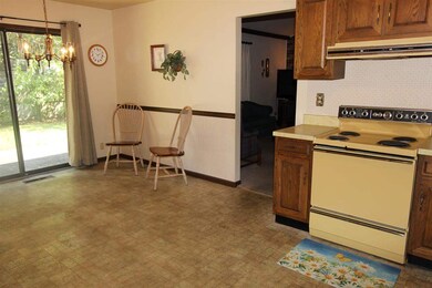 The sliding door in the kitchen leads to the priva