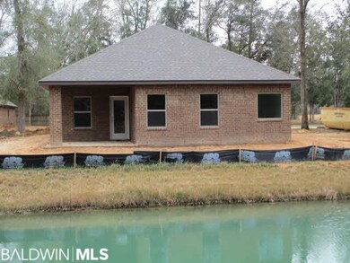 View showing canal frontage and covered patio. Ava