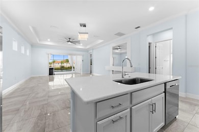 View to your expanded great room from the lovely kitchen