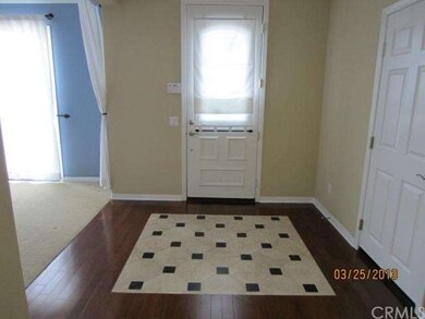 Entry with Decorative Inset Travertine & Marble in
