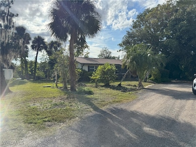 View of front of property featuring a front lawn