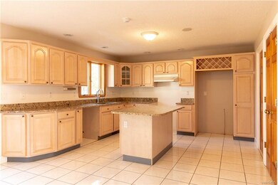 Kitchen with Cambria Stone Counters & Island Storage