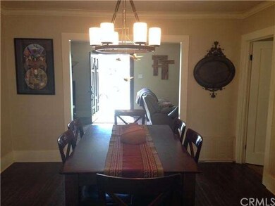 In the dining room looking towards the entry and t