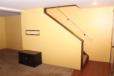 Stairs leading to second floor.  Storage under.