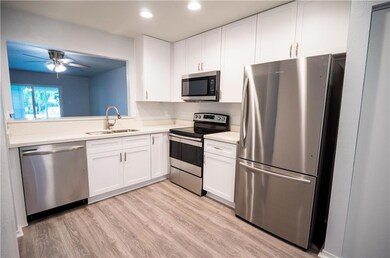 Large kitchen has all new cabinets, counters, Ener