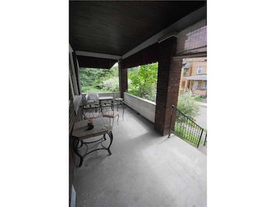 Enjoy relaxing on the breezy front porch.