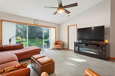 Wall of glass and sliding door leads to private pa