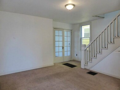 Family Room. Includes French doors from living roo
