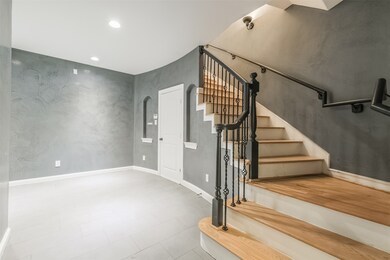 Front entry on 1st floor with garage access