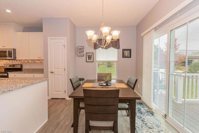 Dining space with light hardwood floors