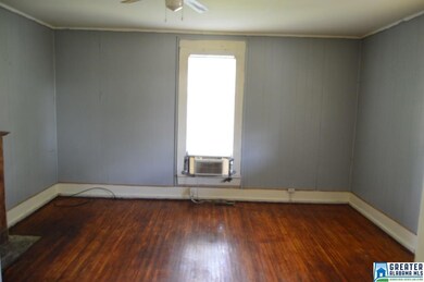 The living room is very spacious and bright with l