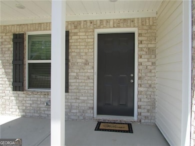 Relax on the covered front porch