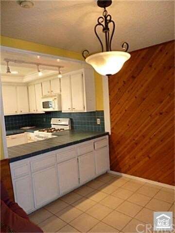 Dining area looking into kitchen.