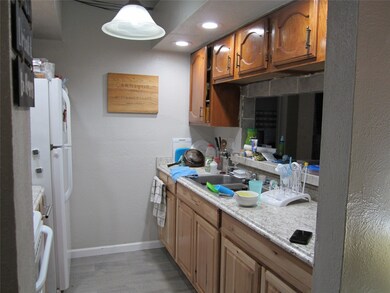 Kitchen has updated lower cabinets with recently u