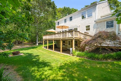 Spacious backyard with firepit