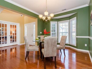 Separate dining room with bay window and beautiful