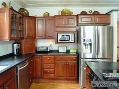 Abundant Work Space: Custom cabinets and a Jenn Ai